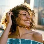 How to Control Frizzy Hair in Summer: A Stylist’s Guide